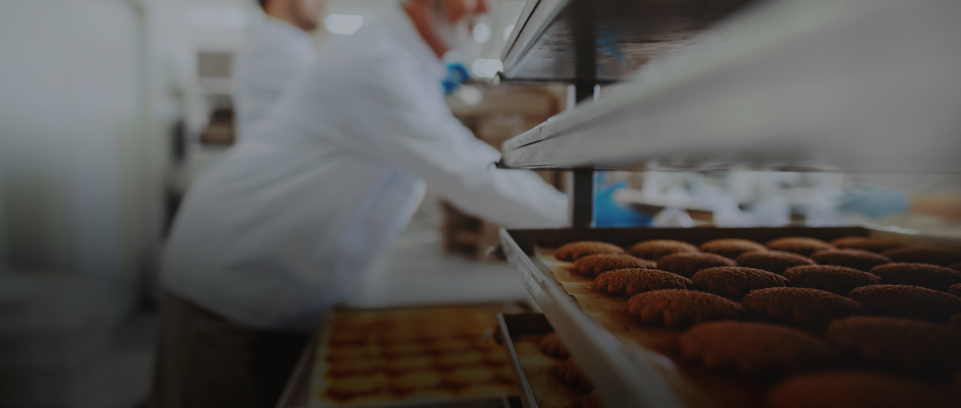 Food production team working on a line